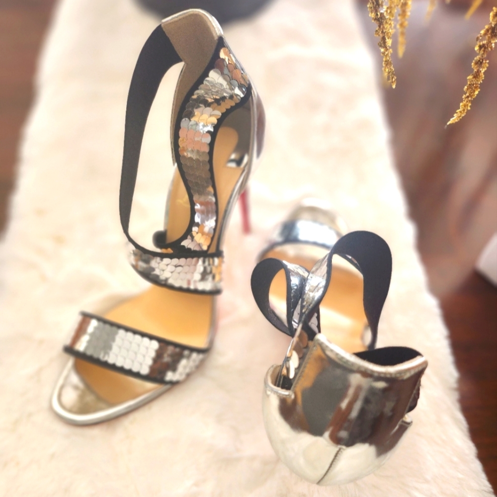 Christian Louboutin " Red Bottoms", 40.5, Mettalic Silver & Black.
